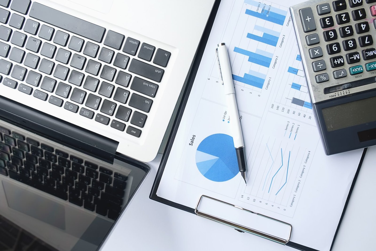 business-concept-with-copy-space-office-desk-table-with-pen-focus-analysis-chart-computer-notebook-cup-coffee-desk-vintage-tone-retro-filter-selective-focus_1418-555.jpg