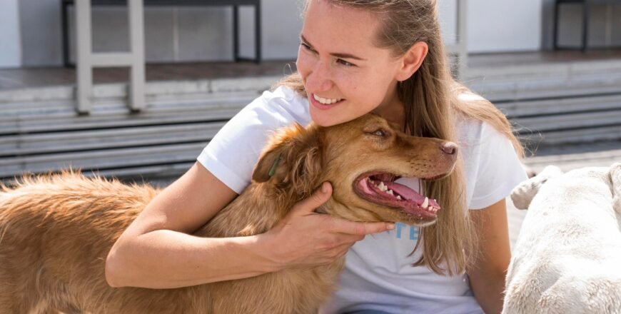 woman-holding-adorable-dog-shelter_23-2148682978.jpg